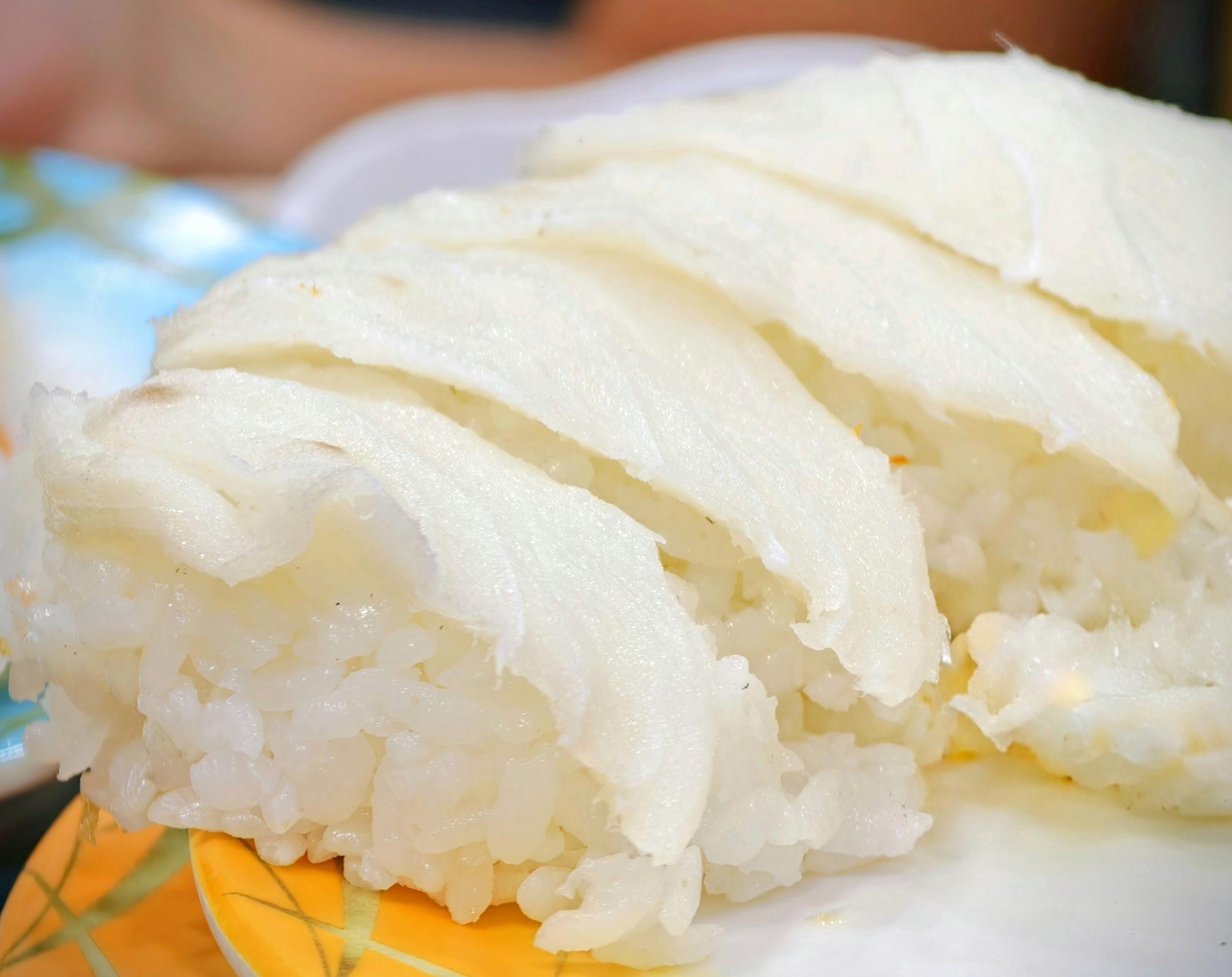 White, generously oily white tuna nigiri